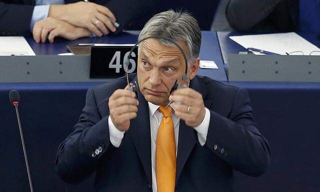 Hungarian Prime Minister Orban arrives to attend a debate on the situation in Hungary at the European Parliament in Strasbourg
