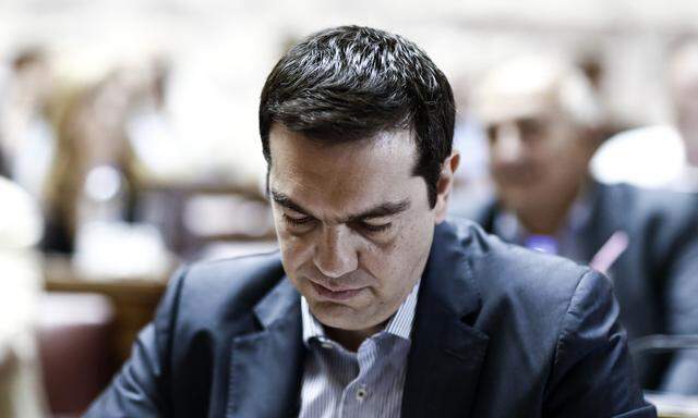 Greece´s Prime Minister Alexis Tsipras Attends Parliament After Bowing To Creditors´ Demands