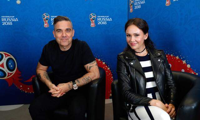 Eröffnen die WM musikalisch: Der britische Popsänger Robbie Williams und Staatsopern-Sopranistin Aida Garifullina.