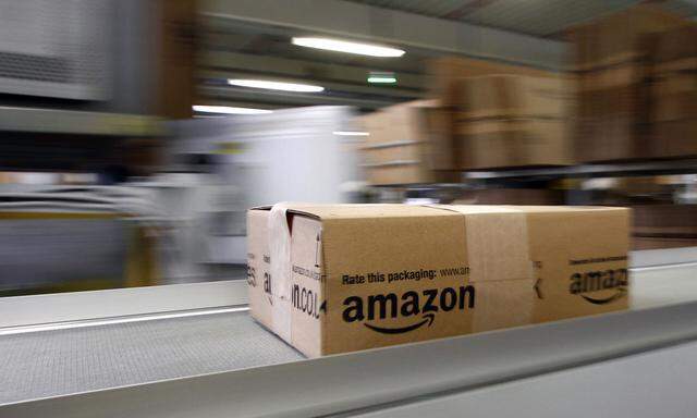 A parcel moves on the conveyor belt at Amazon´s logistics centre in Graben