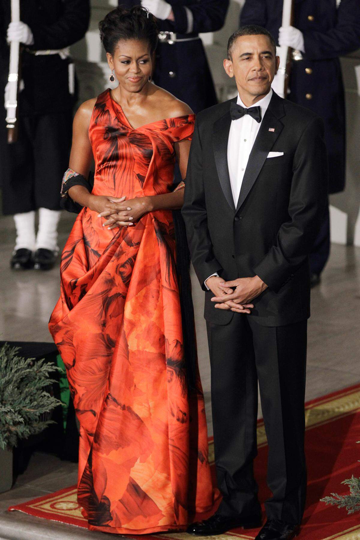Für die britische "Daily Mail" war es das "Outfit des Jahres 2011". Michelle Obama in einem roten Abendkleid von Sarah Burton bei einem Staatsbankett in China.