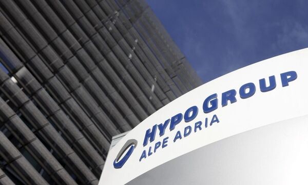 A logo of the Hypo Group Alpe Adria Bank is pictured at their headquarters in Klagenfurt