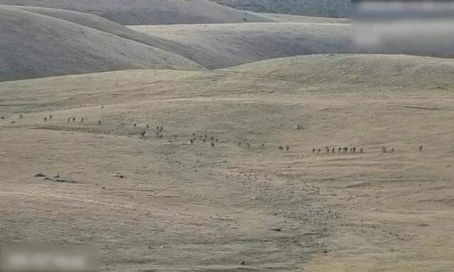 A still image shows said to be Azerbaijani soldiers at an unidentified location