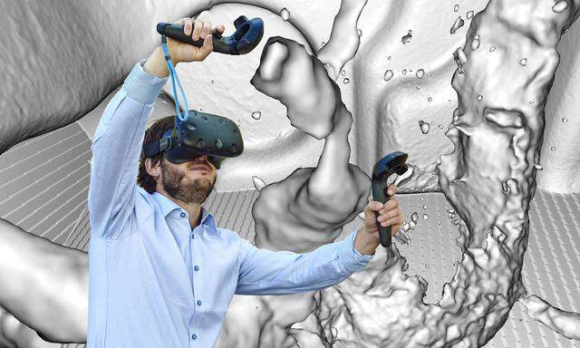 Aardworx-Mitgründer Harald Steinlechner navigiert sich mit VR-Brille durch ein Alu-Getriebegehäuse.