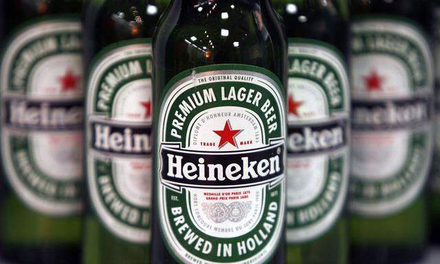 File photo shows bottles of Heineken beer displayed before a news conference in London