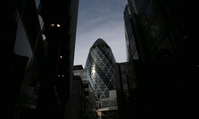 The 30 St Mary Axe skyscraper which is known locally as 'The Gherkin' is seen in London
