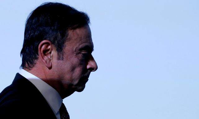 FILE PHOTO: Carlos Ghosn, chairman and CEO of the Renault-Nissan-Mitsubishi Alliance, attends the Tomorrow In Motion event on the eve of press day at the Paris Auto Show, in Paris