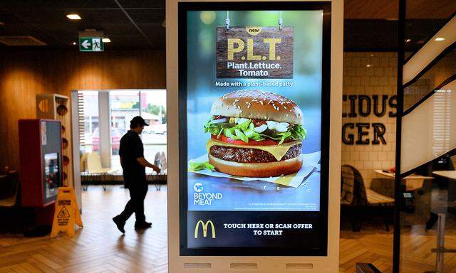 FILE PHOTO: A sign promoting McDonald's 'PLT' burger with a Beyond Meat plant-based patty at one of 28 test restaurant locations in London, Ontario