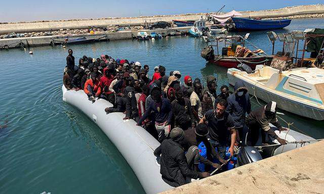Migrants rescued by the Libyan Coast Guards in the Mediterranean Sea arrive in Garaboli
