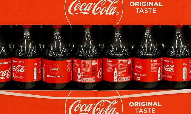 FILE PHOTO: Bottles of Coca-Cola are seen at a Carrefour Hypermarket store in Montreuil, near Paris