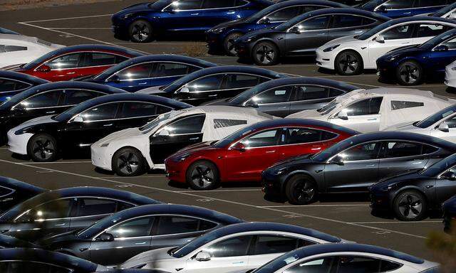 FILE PHOTO: Rows of the new Tesla Model 3 electric vehicles in Richmond