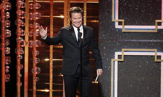 Billy Bush presents the award for outstanding supporting actor in a drama series during the 41st Annual Daytime Emmy Awards in Beverly Hills