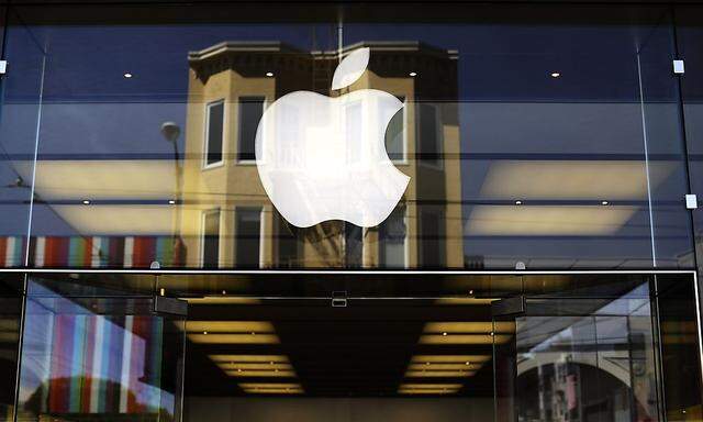 The Apple logo is pictured on the front of a retail store in the Marina neighborhood in San Francisco in this file photo