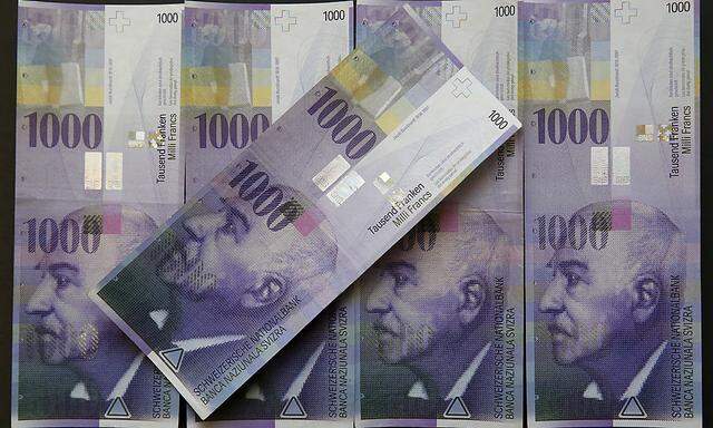 Swiss 1,000-franc notes are seen in this picture illustration