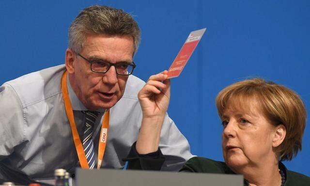 De Maiziere und Merkel