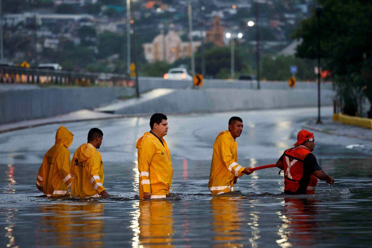 20. Juni. Seit dem Wochenende lösten in Guatemala, Honduras und im Südosten Mexikos (im Bild) heftige Regenfälle Überschwemmungen und Schlammlawinen aus.