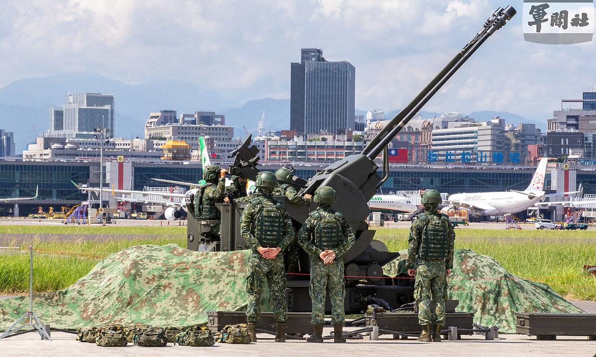 Handout picture of Taiwan Air Force soldiers operating 35-mm anti-aircraft gun in Taiwan