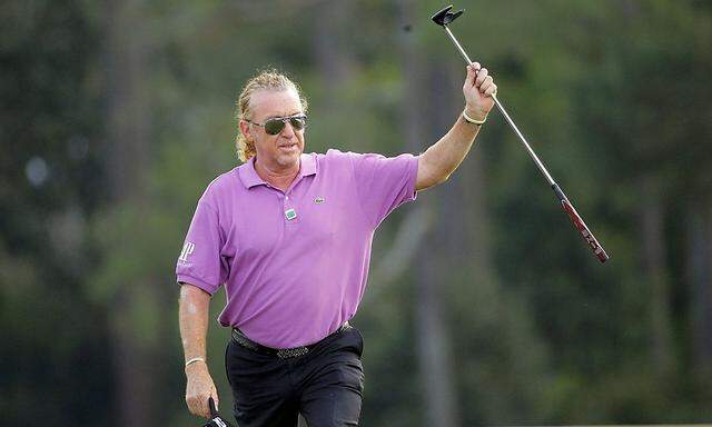 Spain's Miguel Angel Jimenez walks to the 18th green during the final round of the Masters golf tournament at the Augusta National Golf Club in Augusta