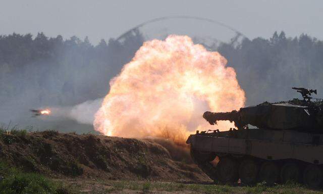 FILE PHOTO: Polish Leopard 2PL tank fires during Defender Europe 2022 military exercise at the military range in Bemowo Piskie