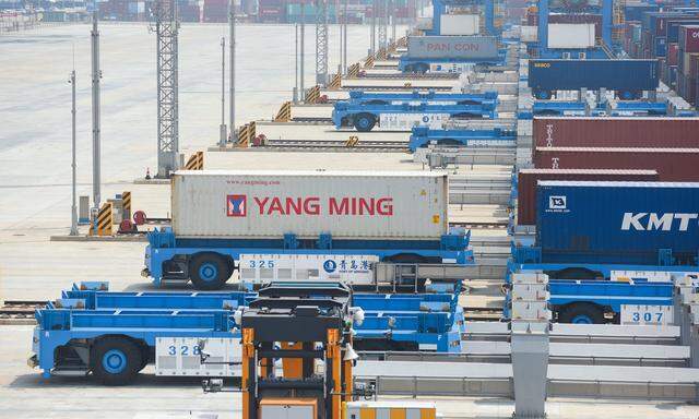 Automated guided vehicles (AGV) are seen at an automated container terminal in Qingdao port