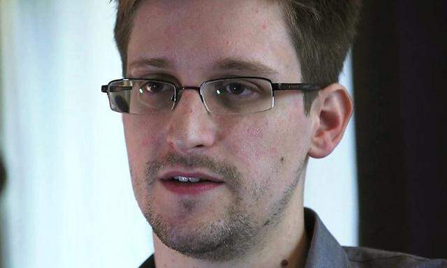 NSA whistleblower Edward Snowden, an analyst with a U.S. defence contractor, is interviewed by The Guardian in his hotel room in Hong Kong