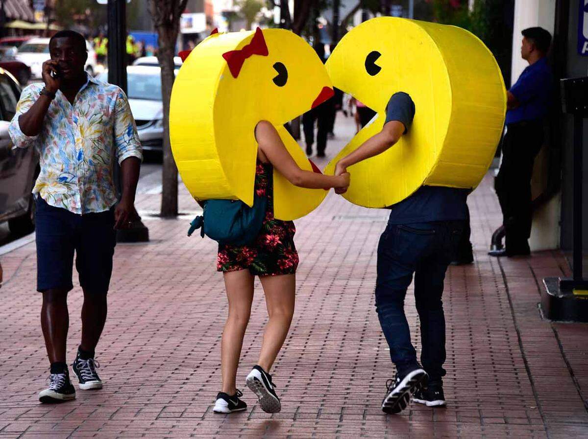 Zur weltgrößten Comicmesse kam dieses Pärchen als Pac-Man.