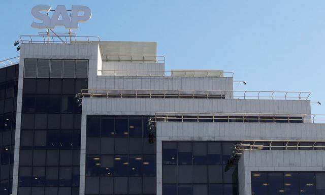 FILE PHOTO: A view shows a sign with the logo of SAP software company on the roof of an office building in Moscow