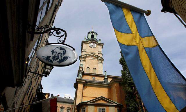 Sweden´s flag is seen near Stockholm Cathedral in Gamla Stan or the Old Town district of Stockholm