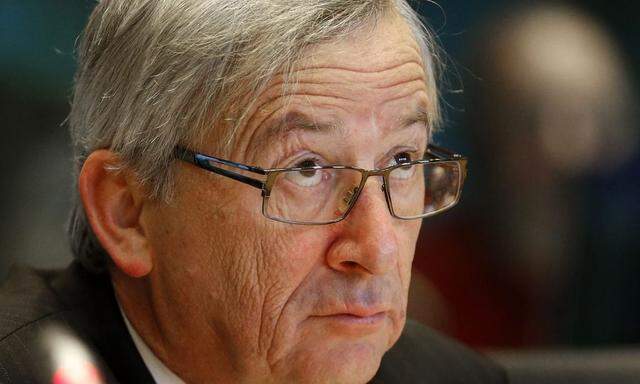 Luxembourg's Prime Minister and Eurogroup chairman Jean-Claude Juncker arrives to testify before the European Parliament's Committee on Economic and Monetary Affairs in Brussels