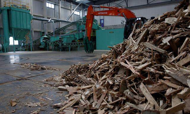 Collected wooden construction wastes are seen at Eco Green Holdings's factory which makes wood chips from construction waste in Tokyo