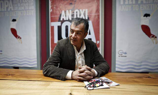 Leader of the newly-founded centrist To Potami party Theodorakis smiles during interview with Reuters at party´s election headquarters in Athens