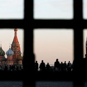 FILE PHOTO: Red Square, St. Basil's Cathedral and the Spasskaya Tower of the Kremlin are seen through a gate in central Moscow