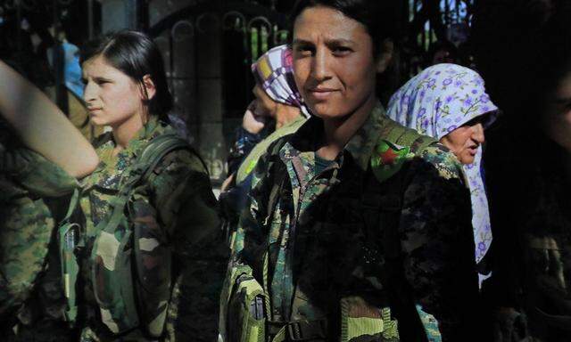 Die kurdischen YPG-Truppen hoffen auf Hilfe von Syriens Präsdient Bashar al-Assad.