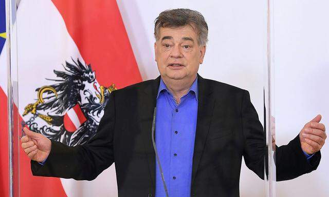 Austrian Vice-Chancellor Kogler attends a news conference in Vienna