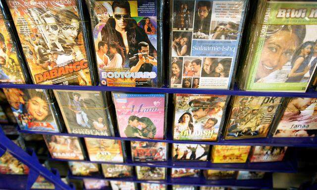Bollywood movies are seen on display at a video store in Islamabad