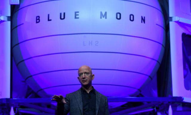 Founder, Chairman, CEO and President of Amazon Jeff Bezos unveils his space company Blue Origin's space exploration lunar lander rocket called Blue Moon during an unveiling event in Washington