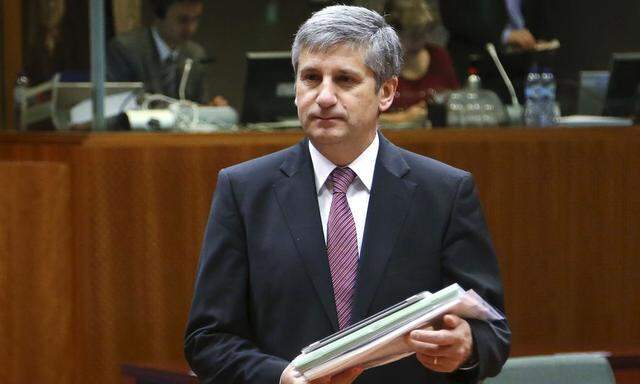 Austrian Finance Minister Spindelegger arrives at an EU finance ministers meeting in Brussels