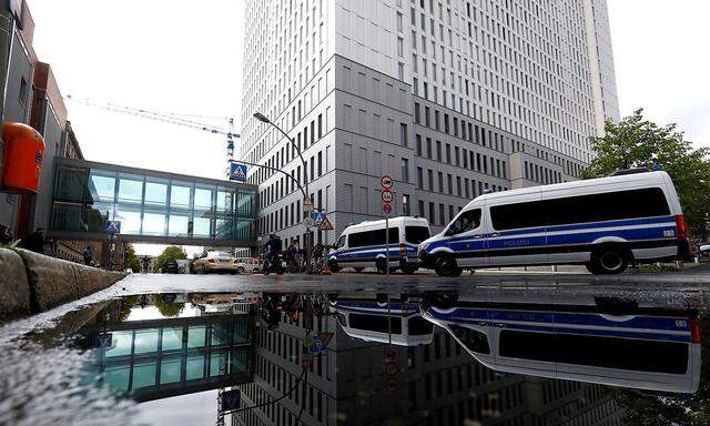 FILE PHOTO: A view shows police vehicles outside the Charite Mitte Hospital Complex in Berlin