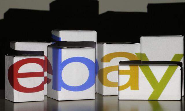 An eBay logo is projected onto white boxes in this illustration picture taken in Warsaw