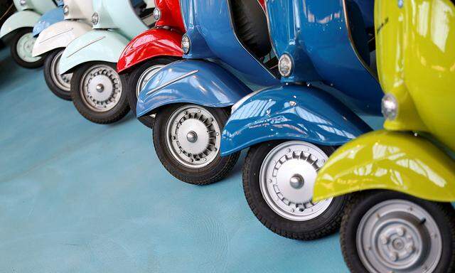 FILE PHOTO: Vespa scooters are seen at the Piaggio Museum during the celebrations to mark the 50th anniversary of Vespa Primavera in Pontedera