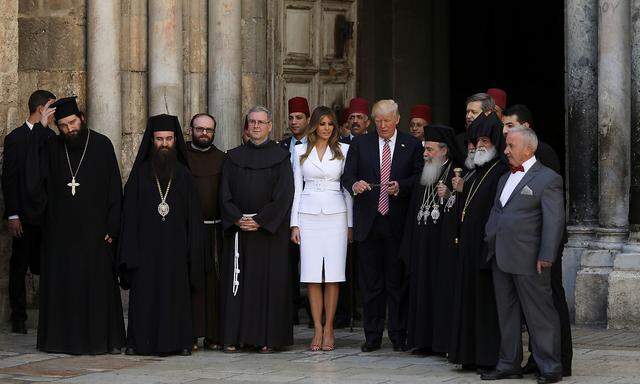 FILE PHOTO: U.S. President Donald Trump and first lady Melania stand at the entrance of the Church of the Holy Sepulchre in Jerusalem´s Old City