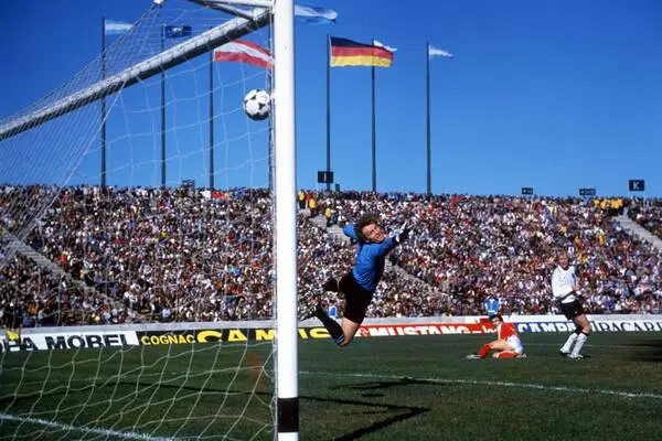 Hans Krankl scores against Germany goalkeeper Sepp Maier in Córdoba. 