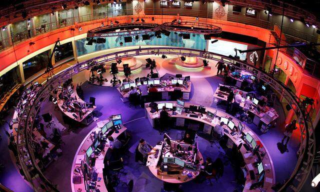 FILE PHOTO: A general view shows the newsroom at the headquarters of the Qatar-based Al Jazeera English-language channel in Doha