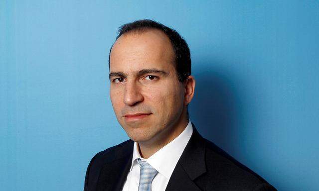 FILE PHOTO: Expedia CEO Dara Khosrowshahi poses for a portrait during the 2010 Reuters Travel and Leisure Summit in New York