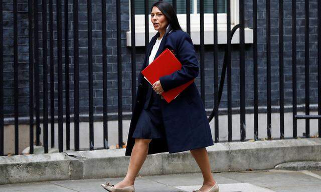 Priti Patel, Britain's Secretary of State for International Development arrives in Downing Street, in London