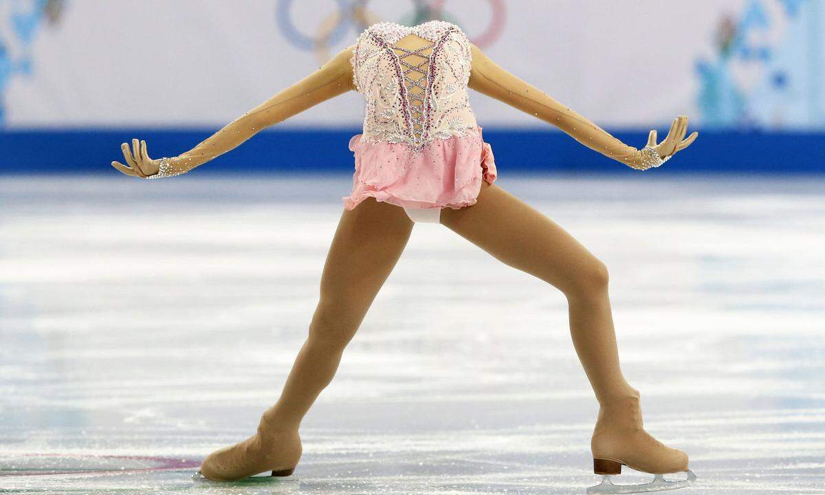 Eiskunstlauf verlangt Akrobatik, Kunst, Geschick. Wer muss da schon nachdenken? Die Chinesin Li Zijun schafft es auch ohne Kopf