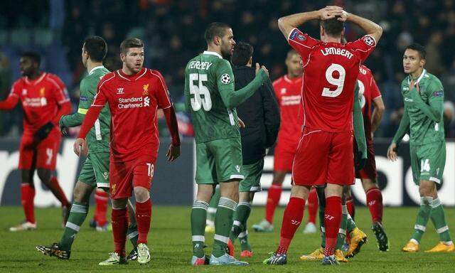 Players of Ludogorets and Liverpool react at the and of their Champions League soccer match in Sofia