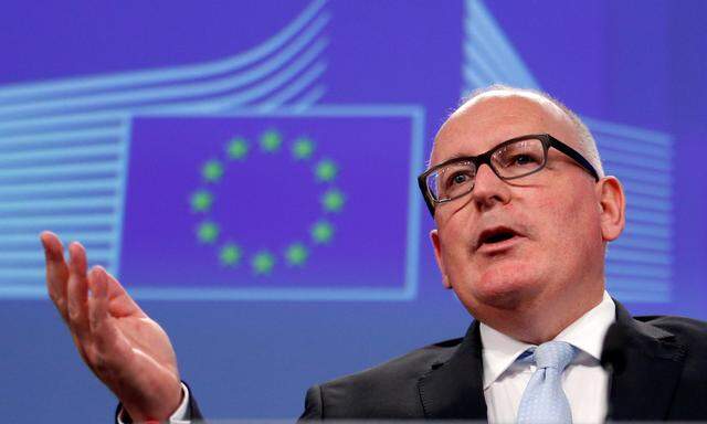 EU Commission First Vice-President Timmermans addresses a news conference in Brussels