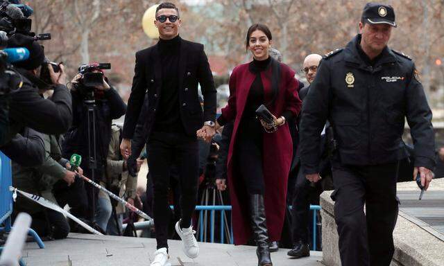 Portugal's soccer player Cristiano Ronaldo arrives to appear in court on a trial for tax fraud in Madrid