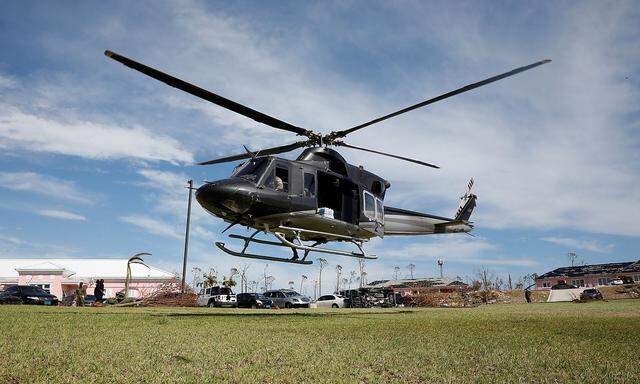 A helicopter takes off outside Marsh Harbour Healthcare Center after hurricane Dorian hit the Abaco Islands in Marsh Harbour